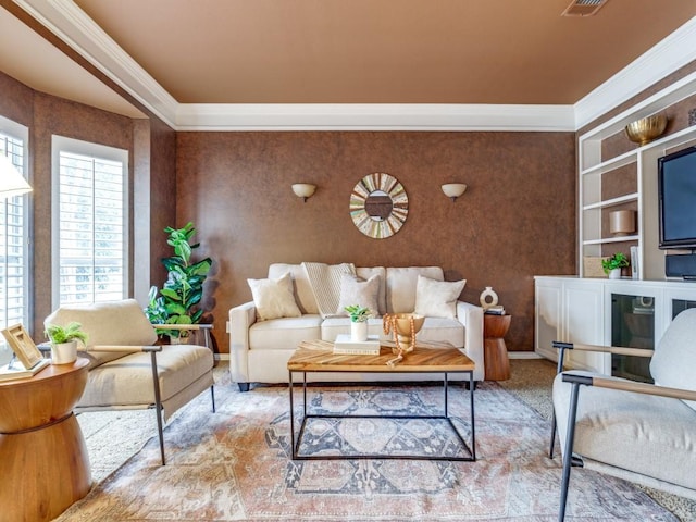 carpeted living room with ornamental molding and built in features