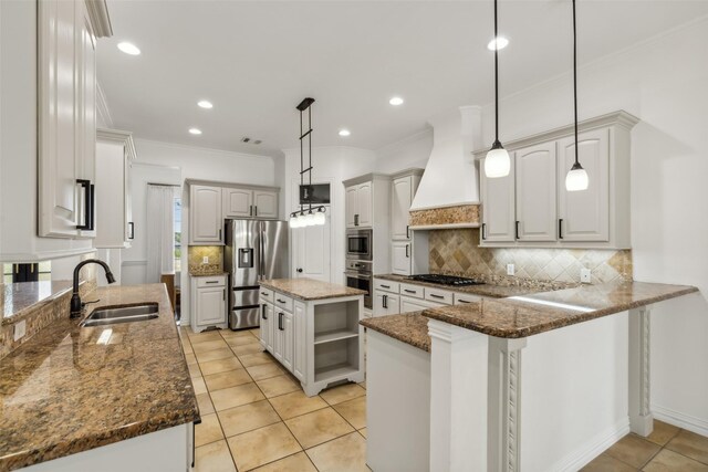 kitchen with stainless steel refrigerator with ice dispenser, ceiling fan with notable chandelier, pendant lighting, white cabinets, and light tile patterned flooring