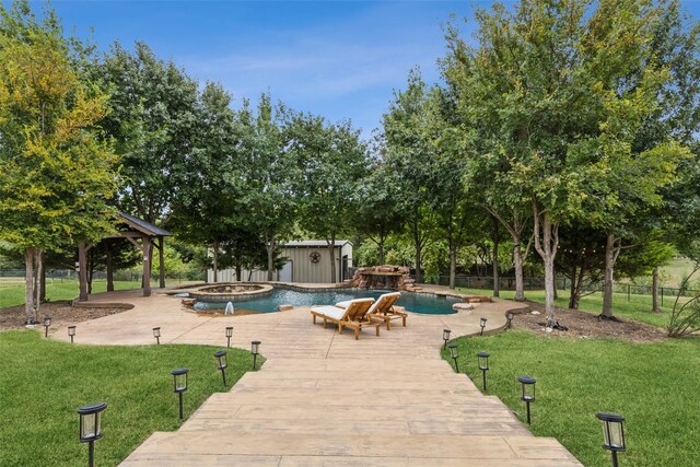 view of pool with a gazebo, a yard, and an in ground hot tub