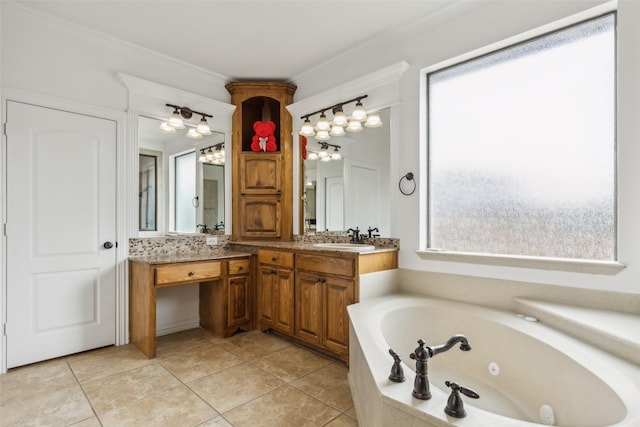 bathroom with vanity, a healthy amount of sunlight, and ornamental molding