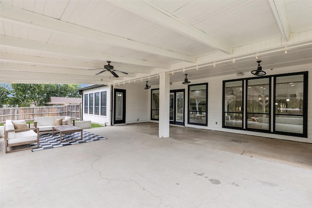 view of patio featuring ceiling fan and an outdoor living space