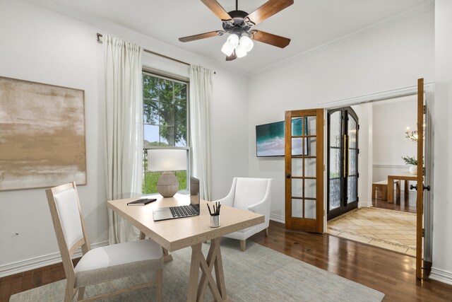 office area featuring crown molding, ceiling fan with notable chandelier, hardwood / wood-style floors, and french doors