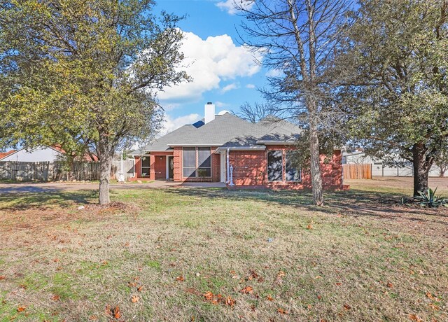 exterior space with a front yard