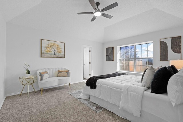 bedroom with ceiling fan, light carpet, and lofted ceiling