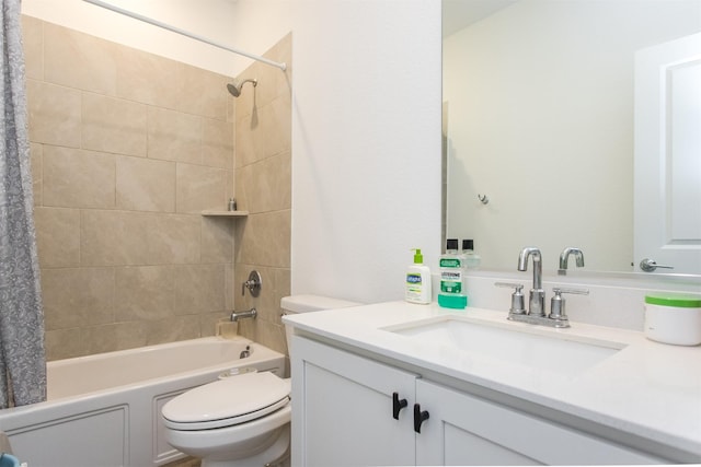 full bathroom featuring shower / bathtub combination with curtain, vanity, and toilet