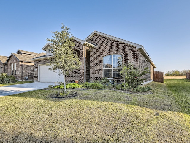 view of front facade with a garage and a front lawn