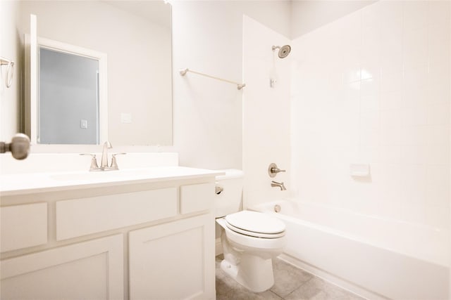 full bathroom featuring vanity, toilet, tiled shower / bath combo, and tile patterned flooring