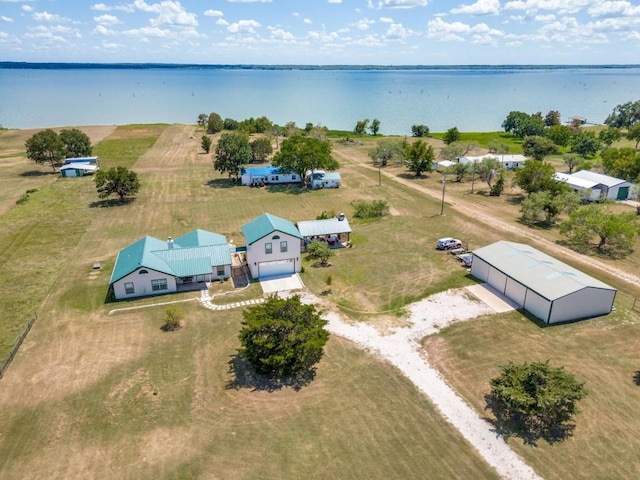 bird's eye view featuring a rural view and a water view