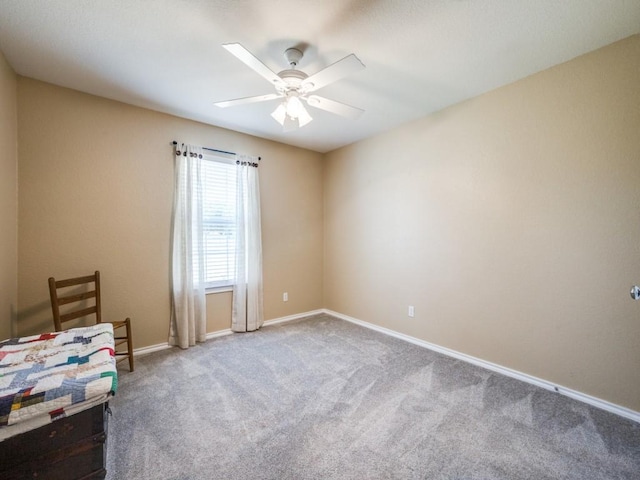 unfurnished bedroom featuring carpet flooring and ceiling fan