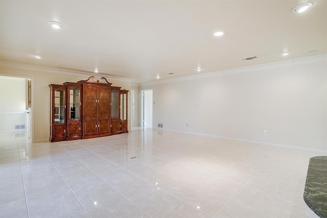 tiled empty room with ornamental molding