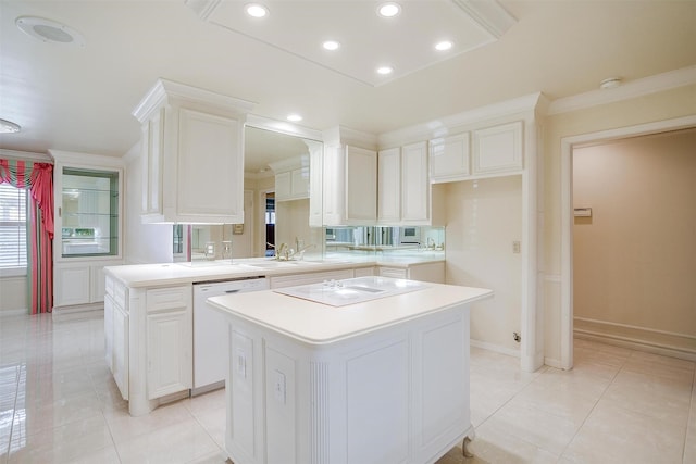 kitchen with dishwasher, kitchen peninsula, a kitchen island, and white cabinets