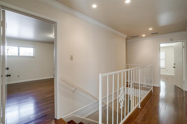 unfurnished room with crown molding and hardwood / wood-style floors