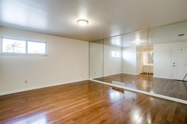 empty room featuring hardwood / wood-style floors