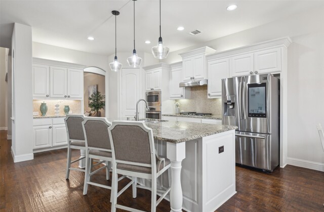 living room featuring french doors, dark hardwood / wood-style floors, and ornamental molding