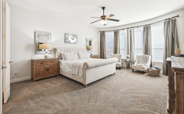 bedroom with ceiling fan and carpet floors