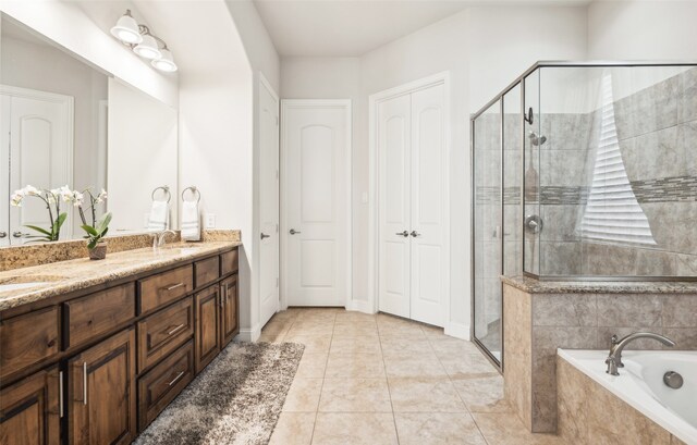 bathroom with plus walk in shower, tile patterned floors, and a wealth of natural light