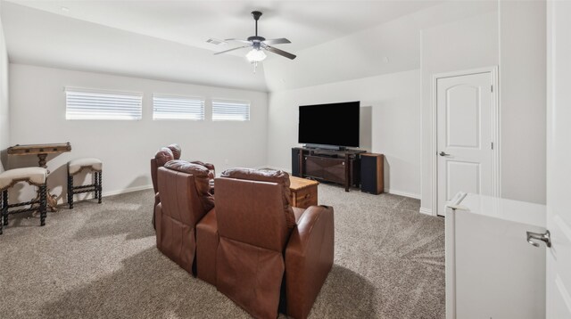 living room featuring carpet flooring, ceiling fan, and lofted ceiling