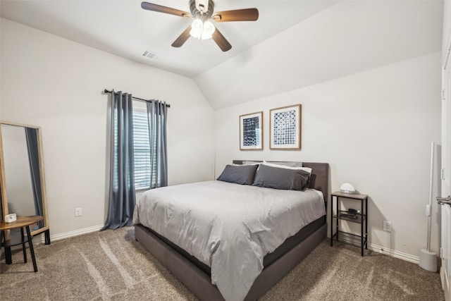 carpeted bedroom featuring ceiling fan and vaulted ceiling