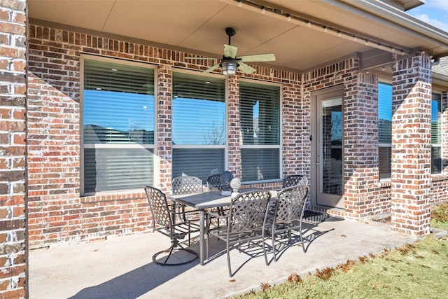 view of patio featuring ceiling fan