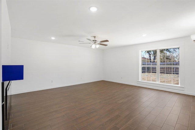 spare room with ceiling fan