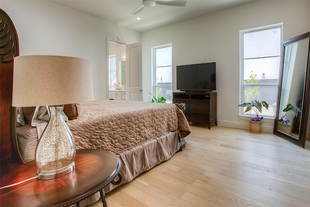 bedroom featuring light hardwood / wood-style floors and ceiling fan