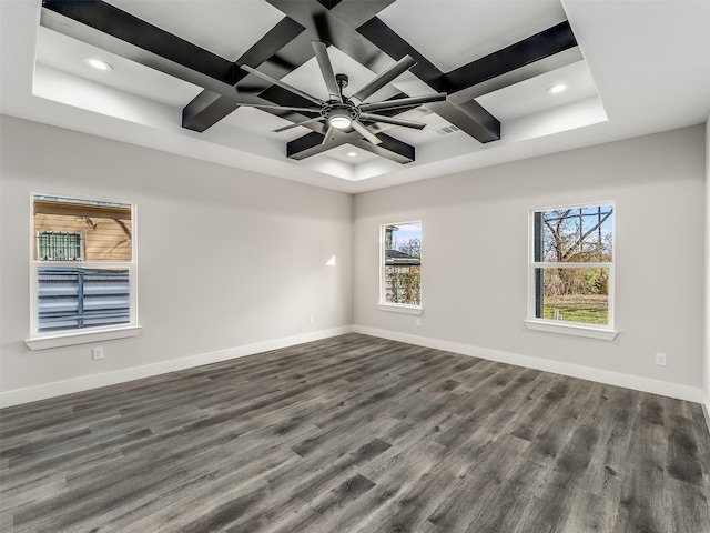 empty room featuring dark hardwood / wood-style floors, ceiling fan, and coffered ceiling