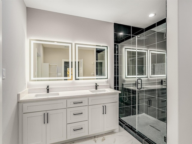 bathroom with vanity and an enclosed shower