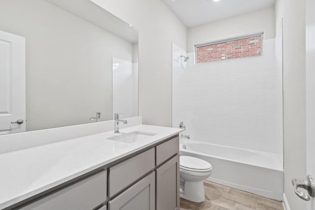 full bathroom featuring vanity, shower / bathing tub combination, and toilet