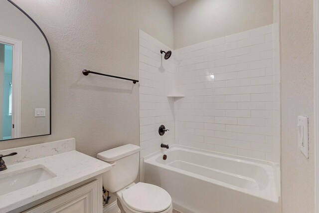 full bathroom featuring vanity, shower / bath combination, and toilet