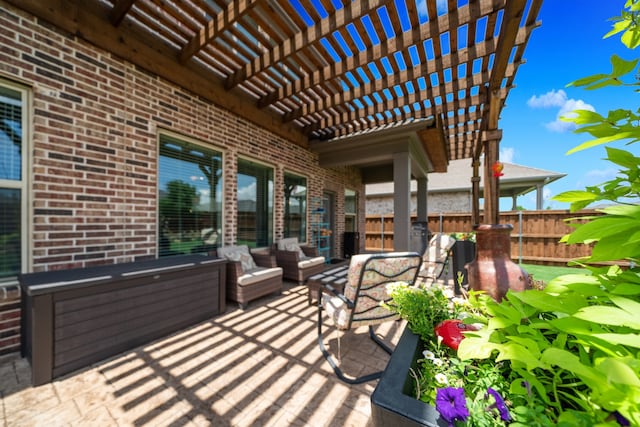 view of patio / terrace featuring an outdoor living space and a pergola