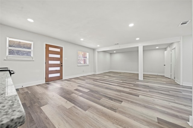 basement with light wood-type flooring