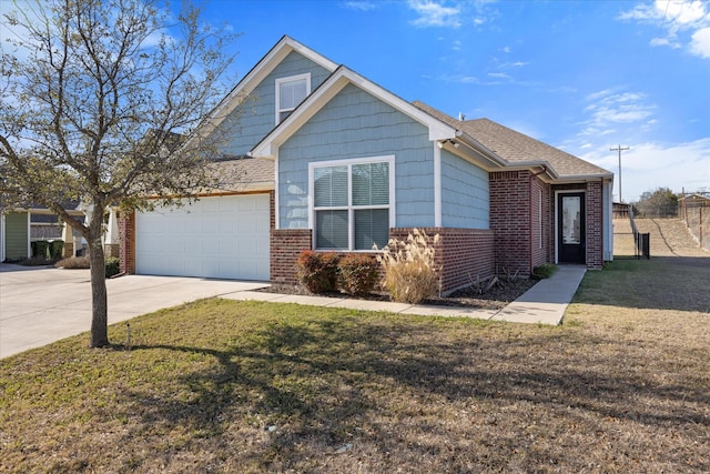 view of front facade with a garage and a front lawn