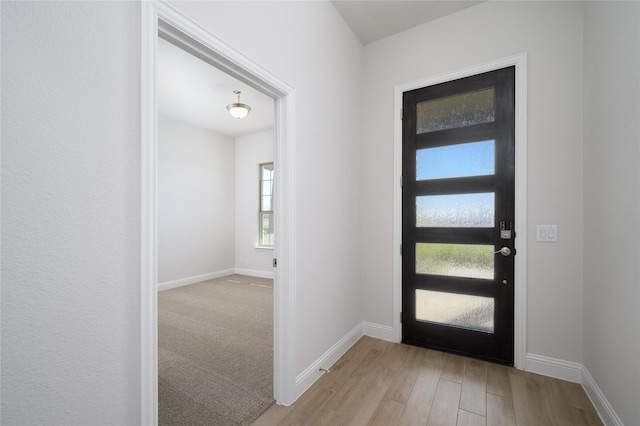 foyer entrance featuring light hardwood / wood-style flooring