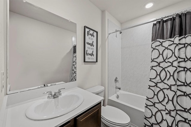 full bathroom featuring shower / tub combo, vanity, and toilet