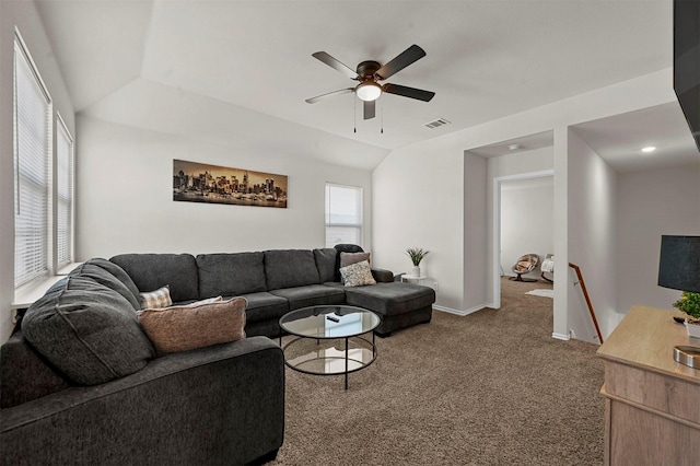 carpeted living room with vaulted ceiling and ceiling fan