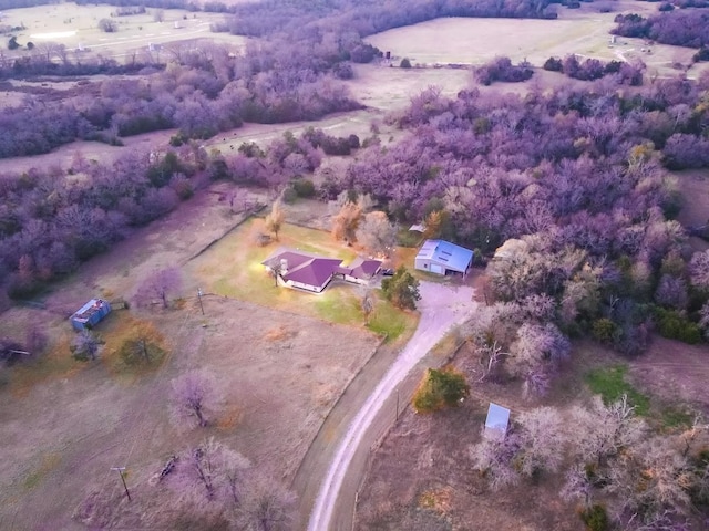 birds eye view of property featuring a rural view