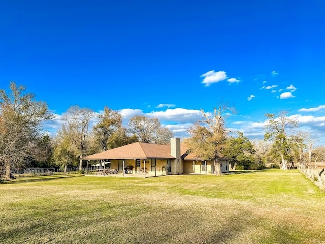 exterior space with a front yard