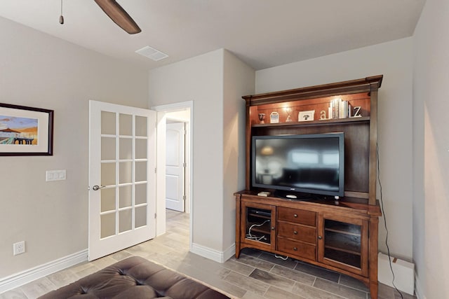 living room featuring ceiling fan