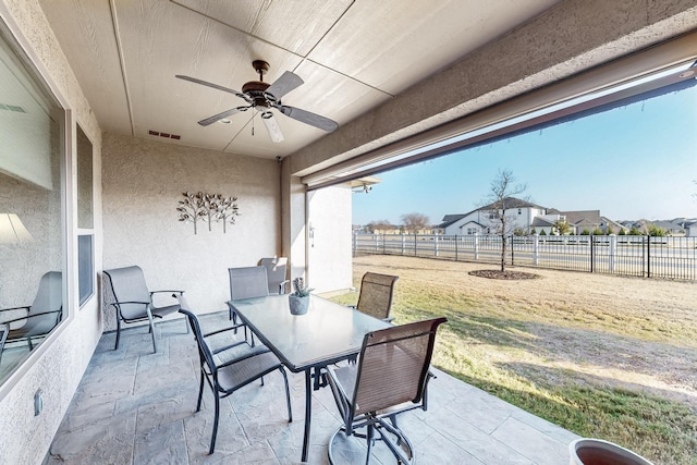 view of patio / terrace featuring ceiling fan