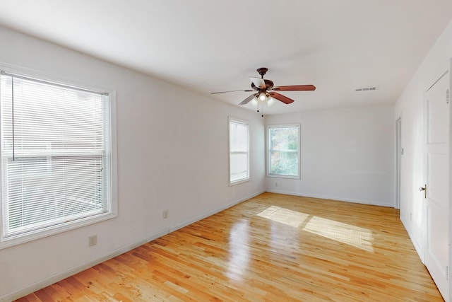 unfurnished room with ceiling fan and light hardwood / wood-style floors