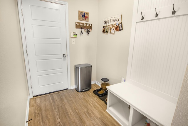 mudroom with light hardwood / wood-style floors