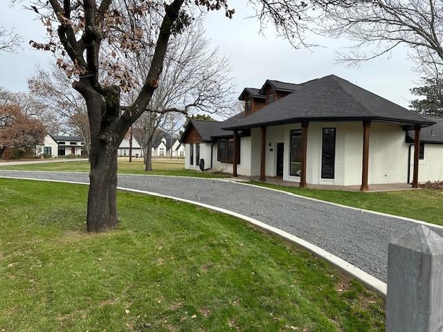 exterior space featuring a lawn