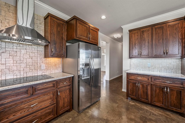 kitchen with backsplash, light stone counters, stainless steel fridge with ice dispenser, black electric cooktop, and wall chimney exhaust hood