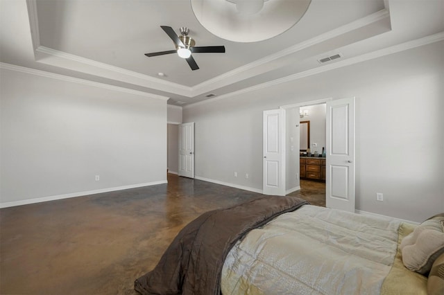 bedroom featuring ornamental molding, ceiling fan, and a tray ceiling