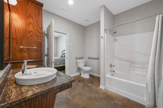 full bathroom featuring toilet, sink, concrete floors, and shower / tub combo with curtain