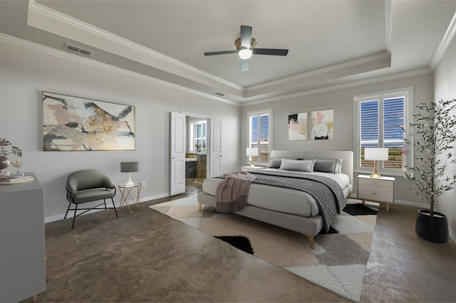 bedroom featuring crown molding, a raised ceiling, ceiling fan, and ensuite bathroom