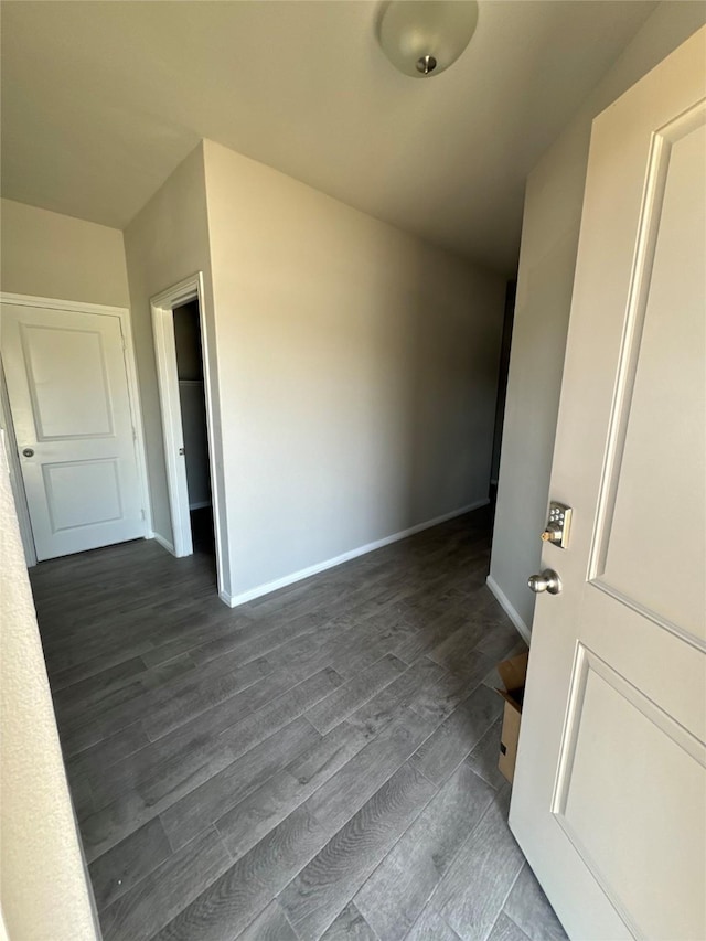 interior space with dark wood-type flooring