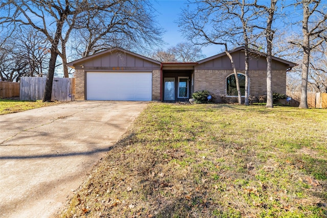 ranch-style house with a front lawn and a garage