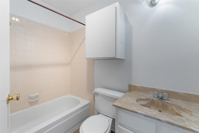 full bathroom with bathtub / shower combination, vanity, and toilet