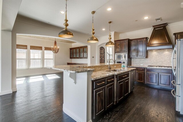 unfurnished dining area featuring plenty of natural light, crown molding, and a chandelier